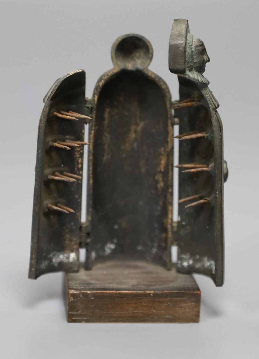 A miniature model of an iron maiden